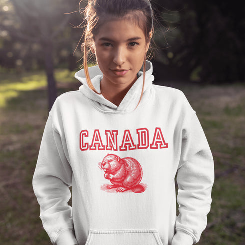 This cozy hoodie features the official mascot of Canadian chill vibes: a Canadian beaver,  And smack-dab above the little guy? The iconic word "Canada," so there's no mistaking your loyalty to the land of snow, syrup, and hockey glory!
